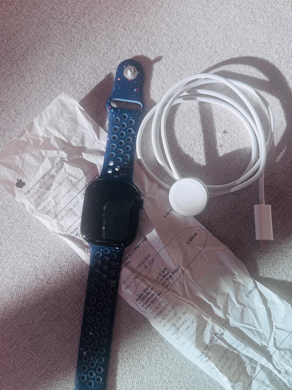 Apple Watch with Blue Perforated Sport Band and White Magnetic Charger like new